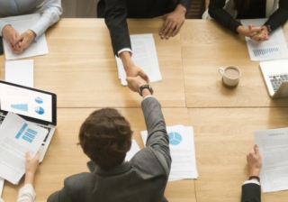 deal agreement business hand handshake acquire