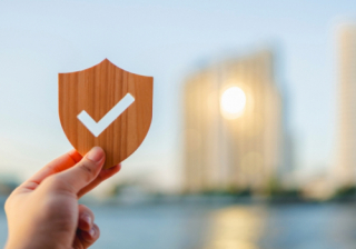 Tick badge in front of buildings