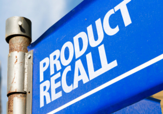 signpost with 'product recall' written on it 