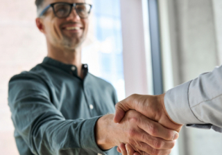 Person shaking someone's hand