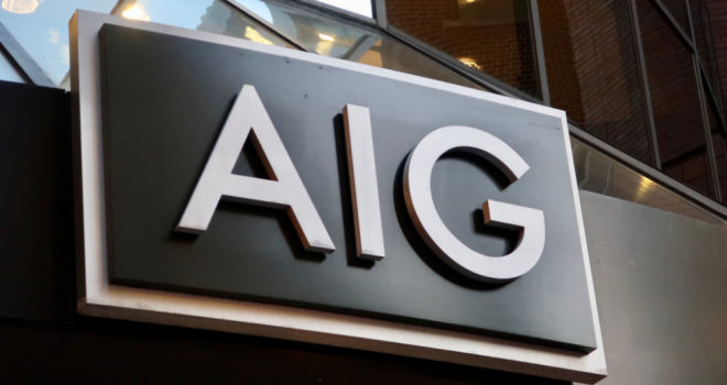 outside of a building with AIG signage