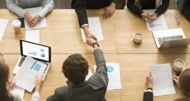 deal agreement business hand handshake acquire