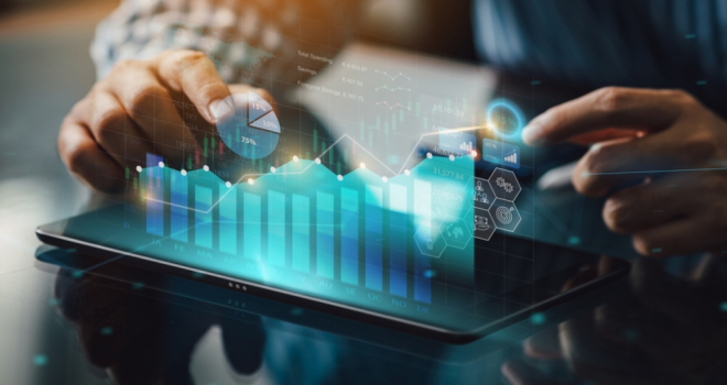 Person looking at various graphs to track trends 