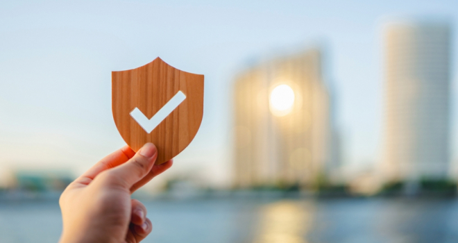 Tick badge in front of buildings