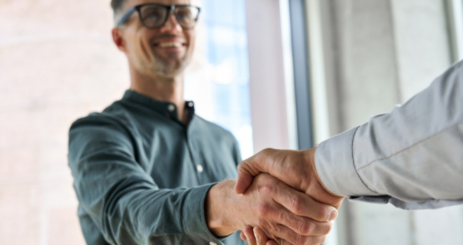 Person shaking someone's hand